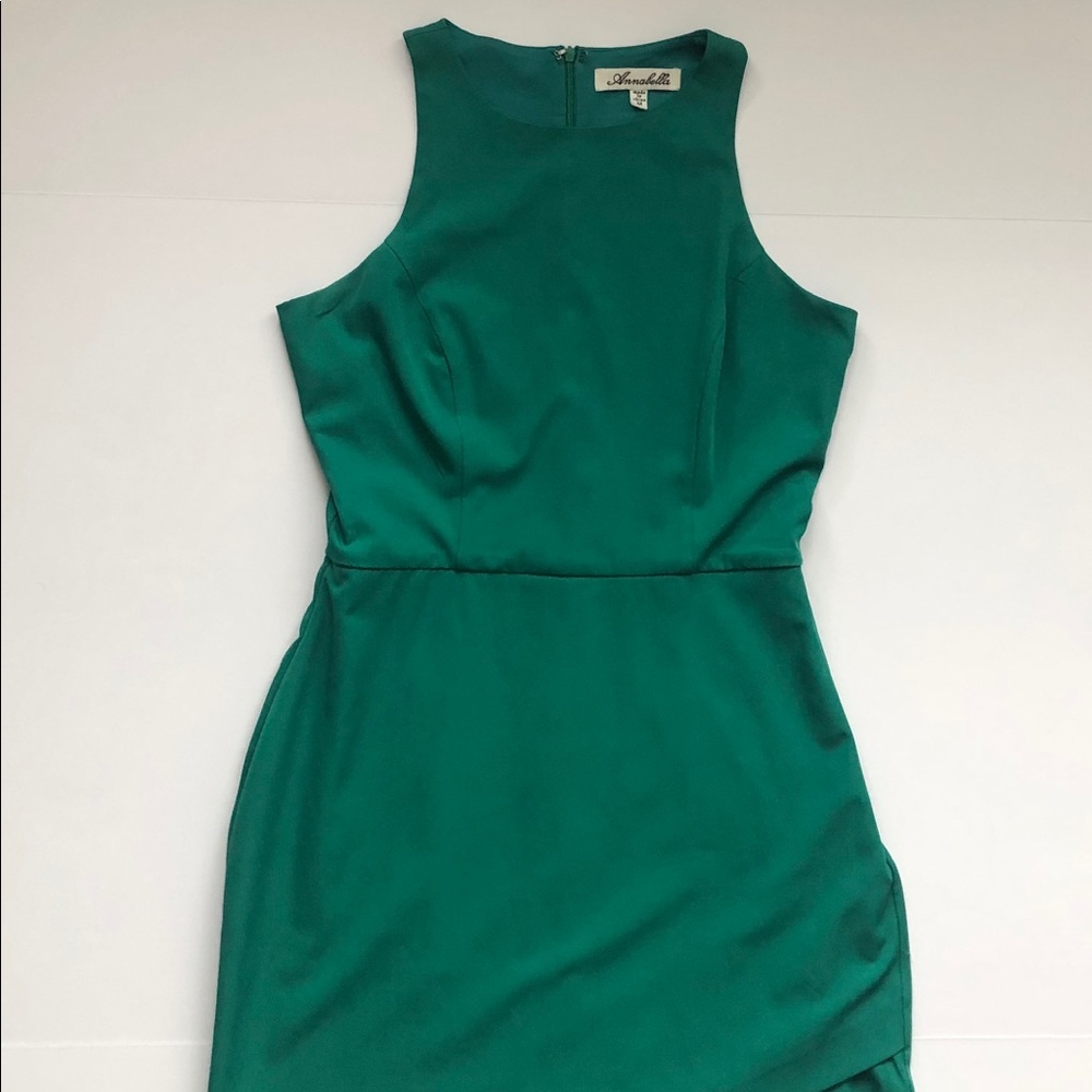 Green dress. Asymmetric bottom.